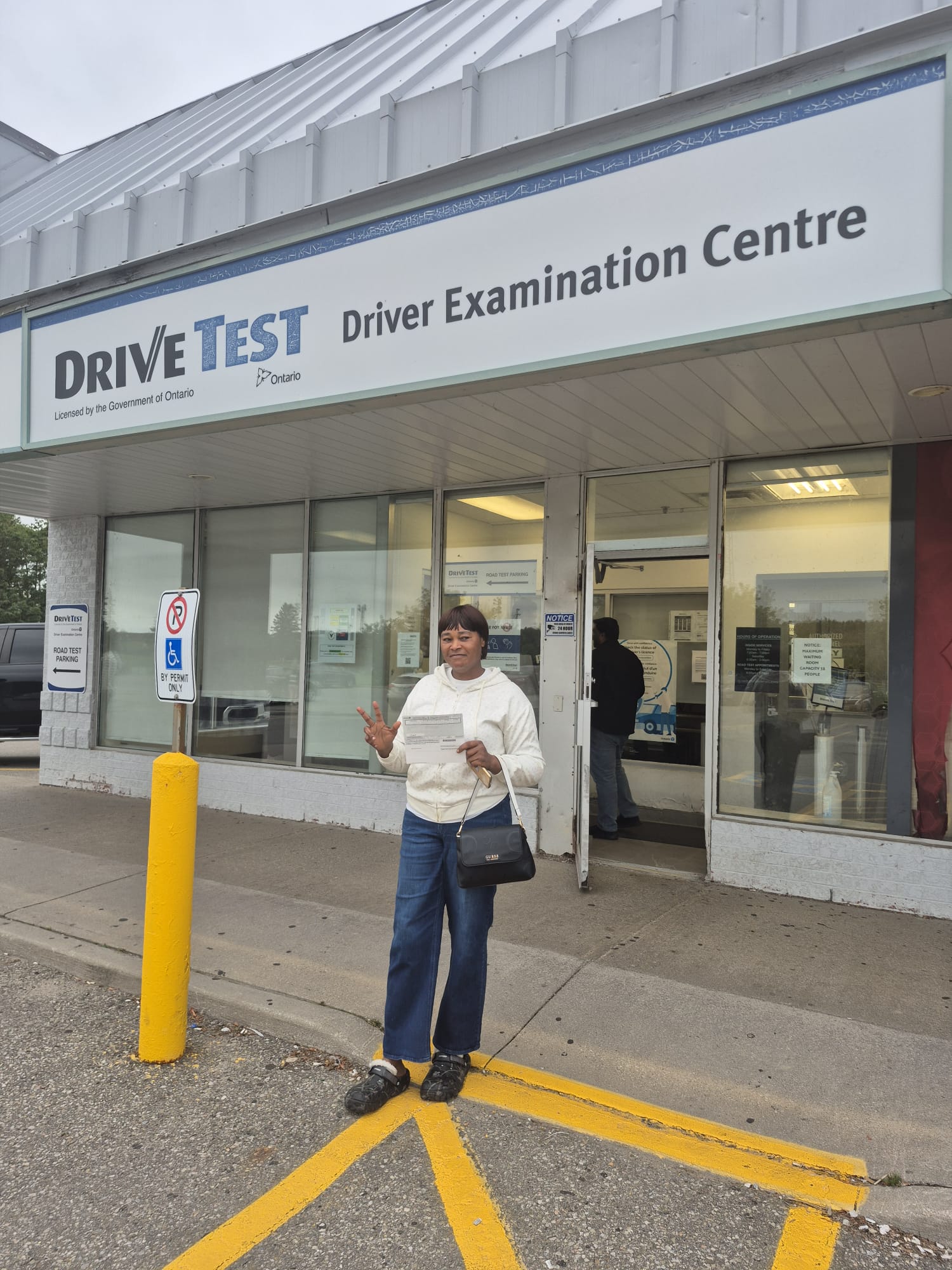 Student smiling at DriveTest centre