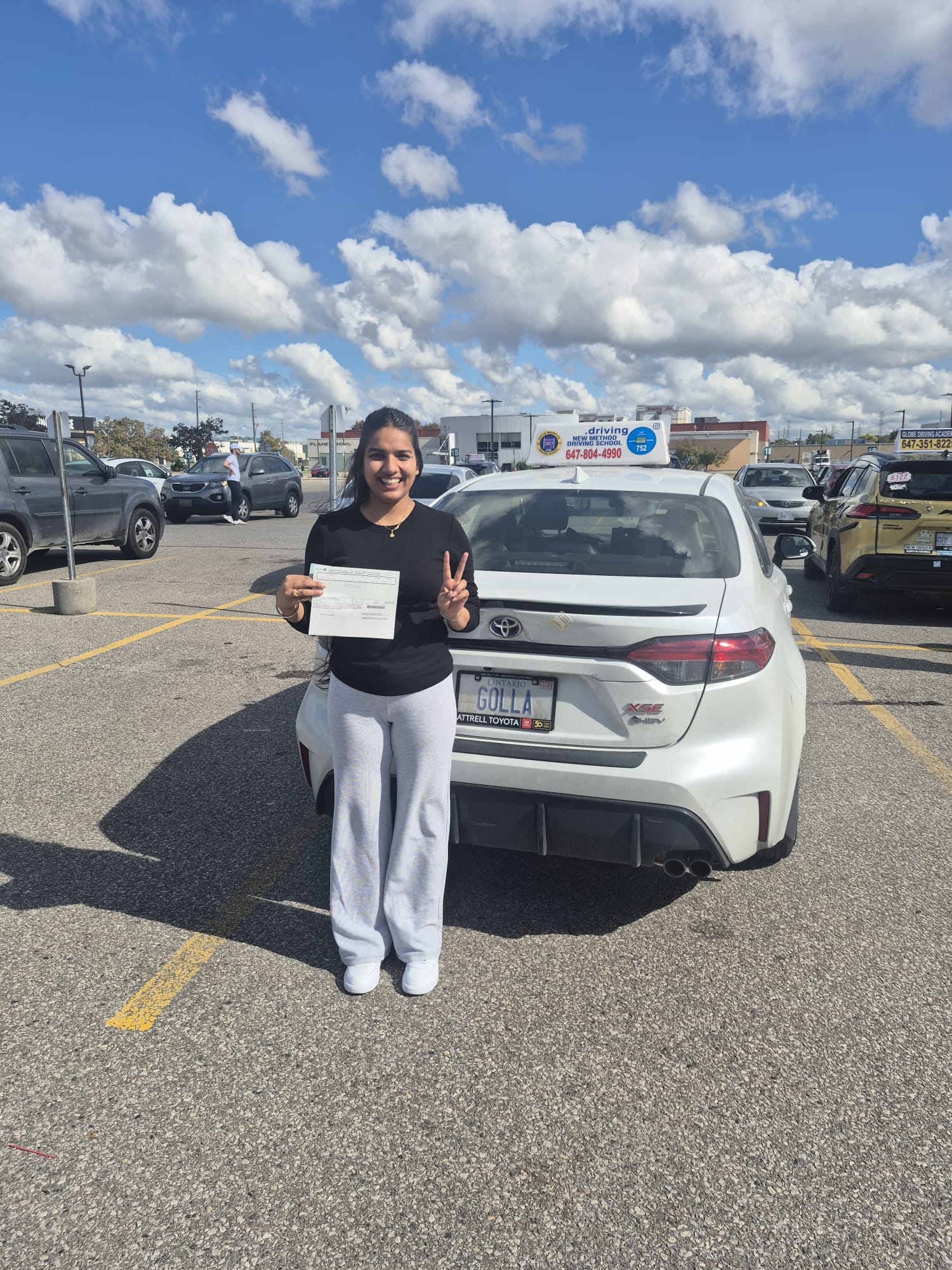 Student celebrating road test victory